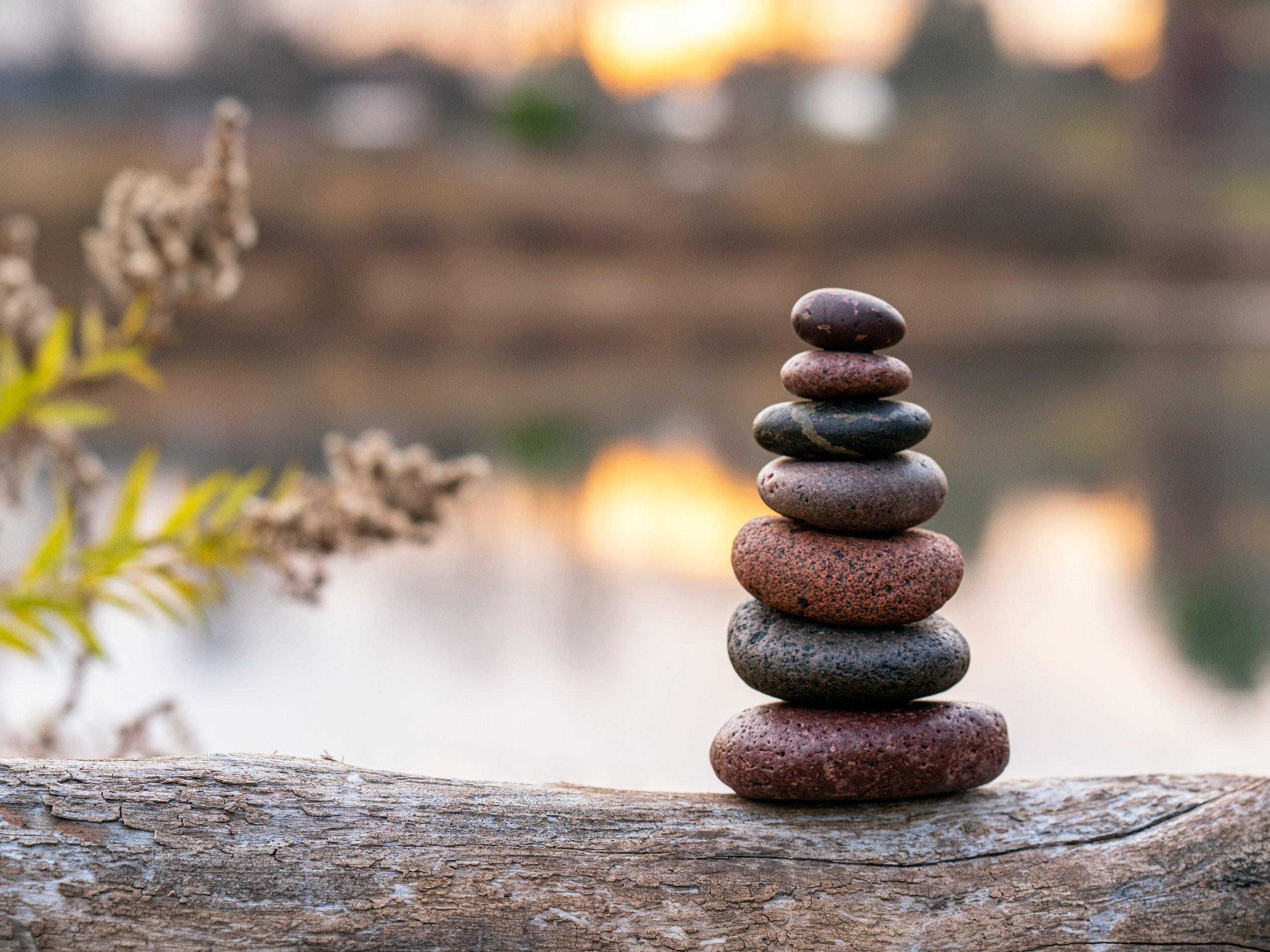Stacked zen stones with soft natural background